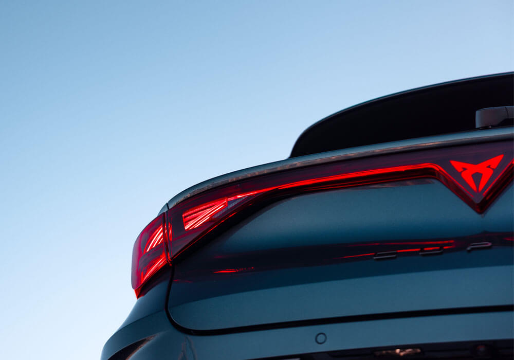 close up low angle of rear lights on a CUPRA sports car