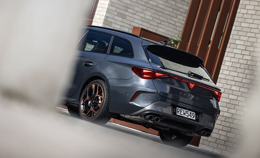 Rear angle photo of a grey Leon Sportstourer