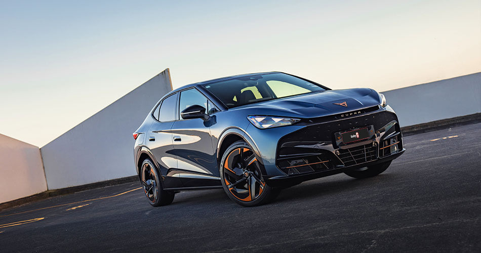 Dutch angle of a blue CUPRA Tavascan sports SUV