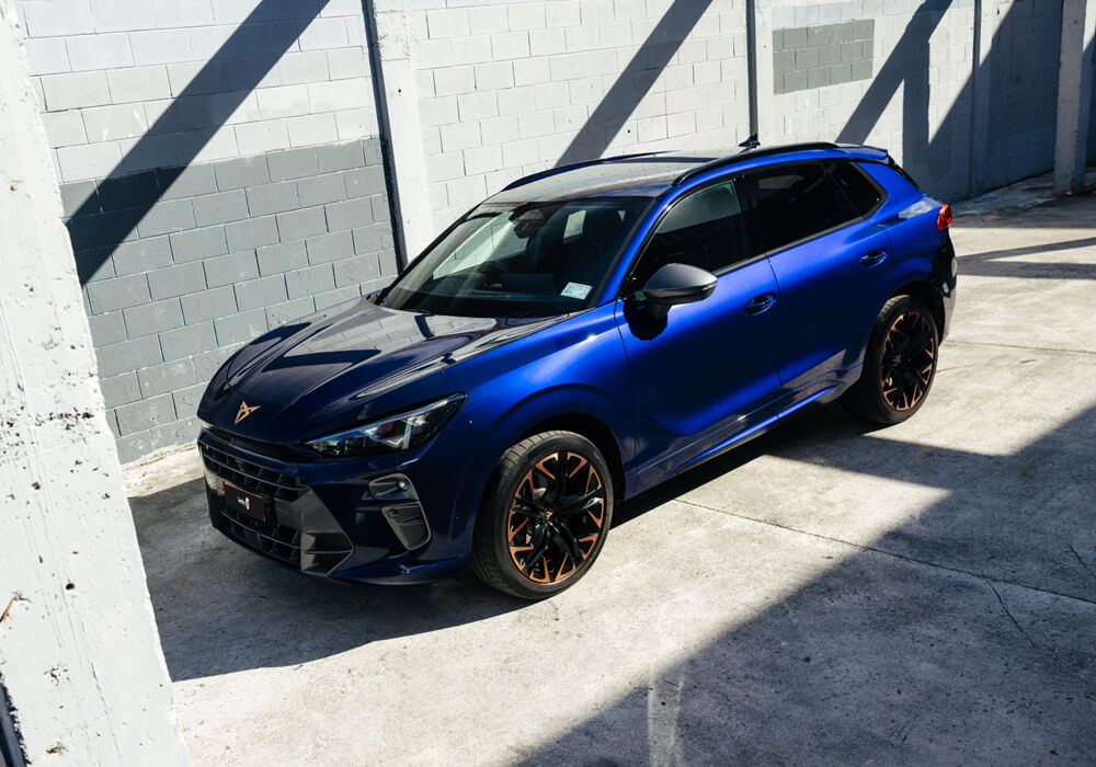 Side & front view of a blue Terramar sports SUV