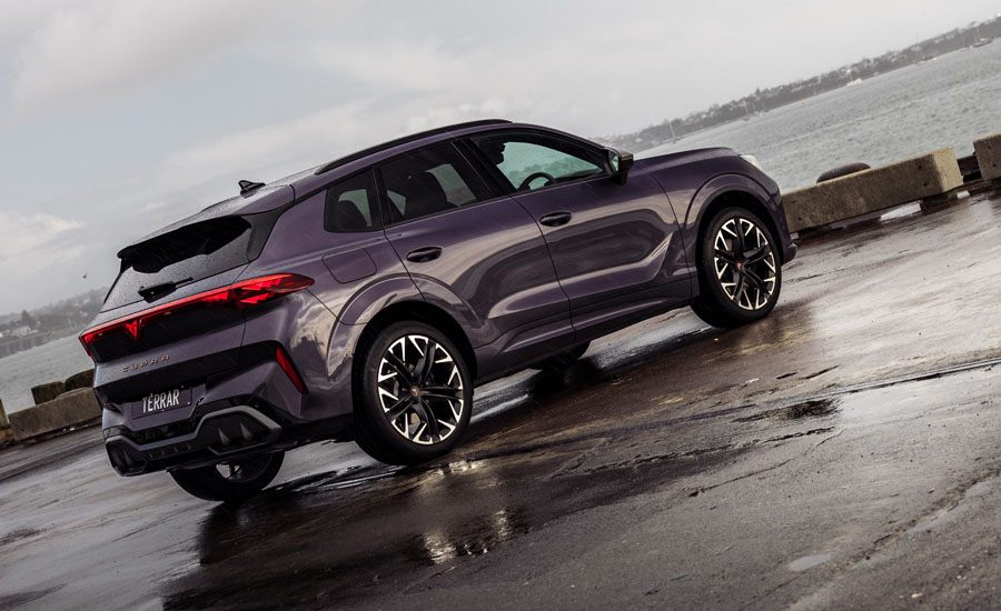 Rear angle of a violet CUPRA sports SUV