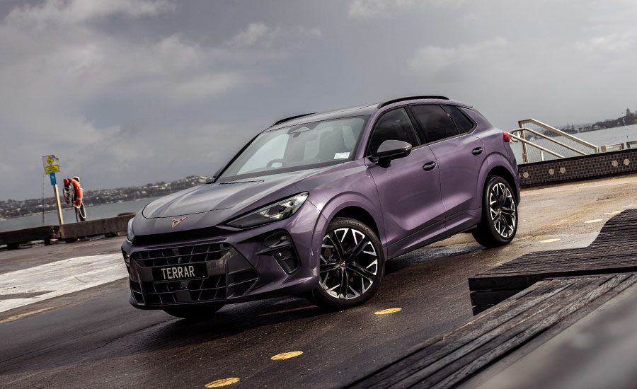 Front 3/4 photo of a violet CUPRA sports SUV