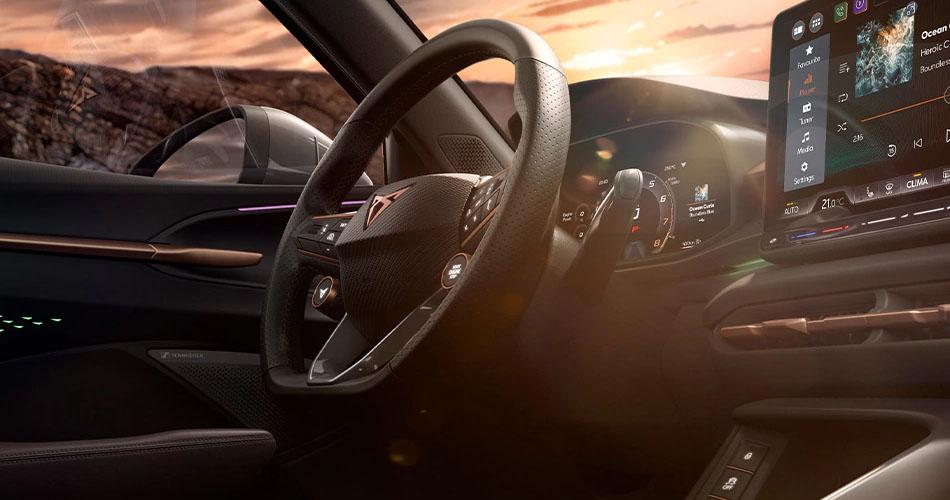 Left hand drive interior of a CUPRA with a sports steering wheel