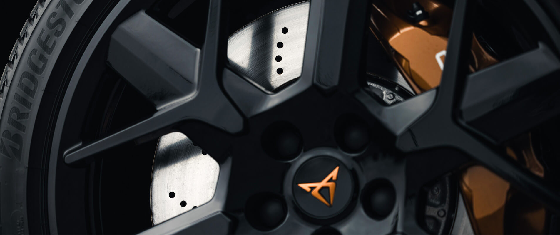 Close up photo of a Cupra car badge